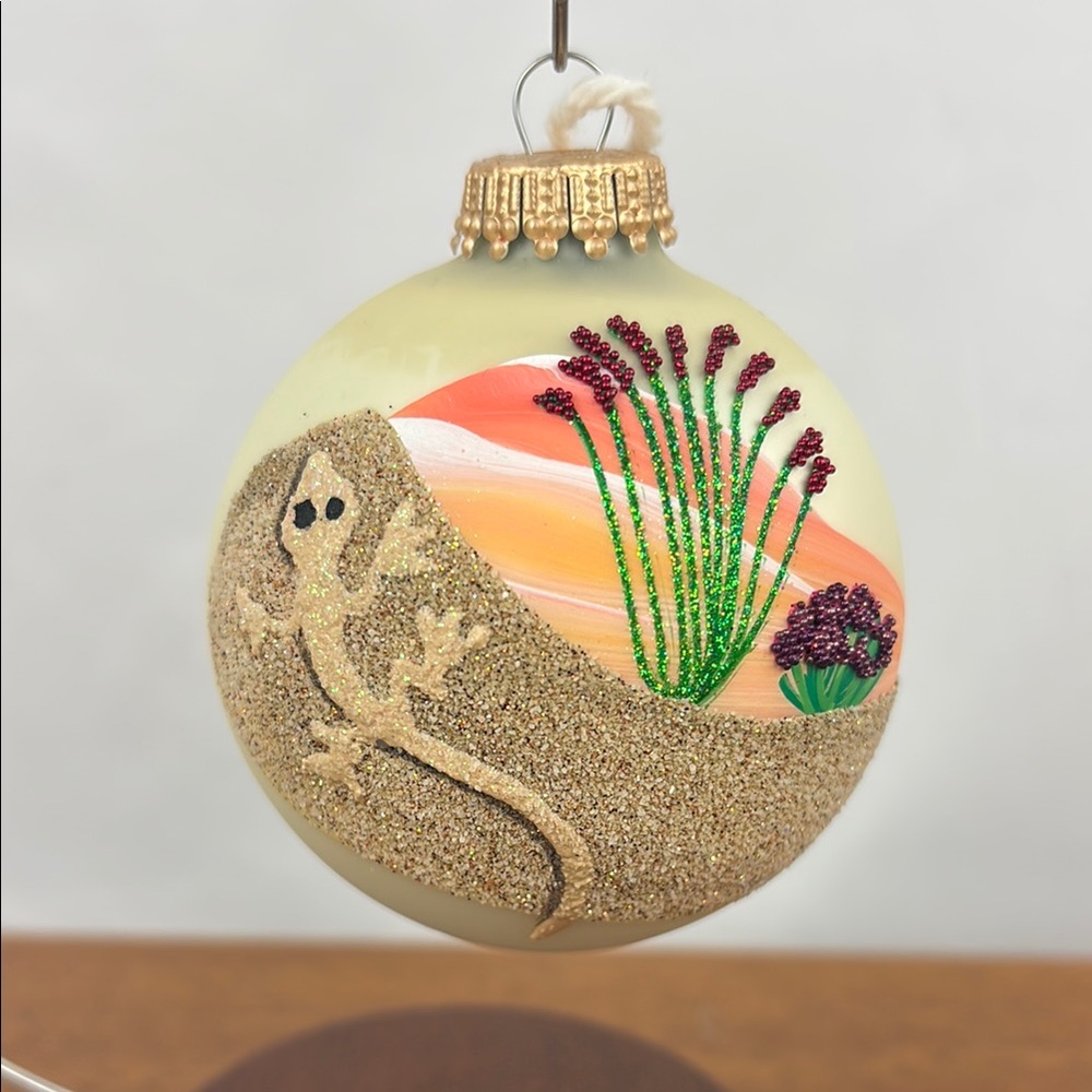 Hand painted southwest desert lizard ball ornament by artist Brenda J. Schodt